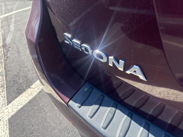 Photo of 2015 Black Berry Kia Sedona