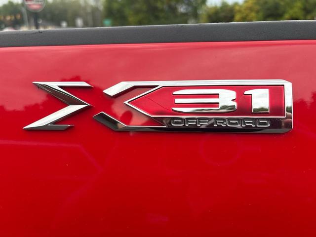 Photo of 2021 Cardinal Red GMC Sierra 2500