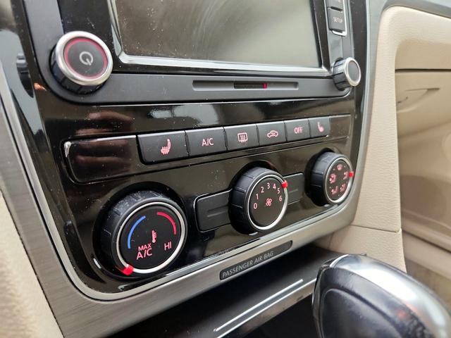 Photo of 2014 Burgundy Volkswagen Passat