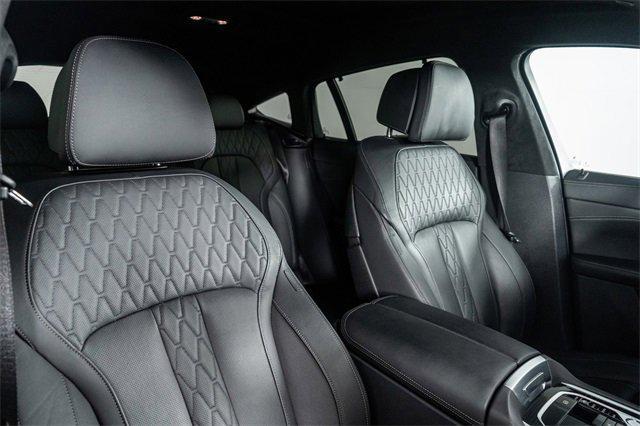 Photo of 2024 Black Sapphire Metallic BMW X6