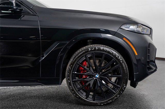 Photo of 2024 Black Sapphire Metallic BMW X6