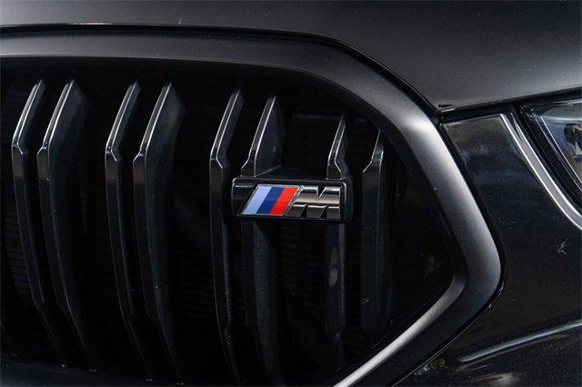 Photo of 2024 Black Sapphire Metallic BMW X6