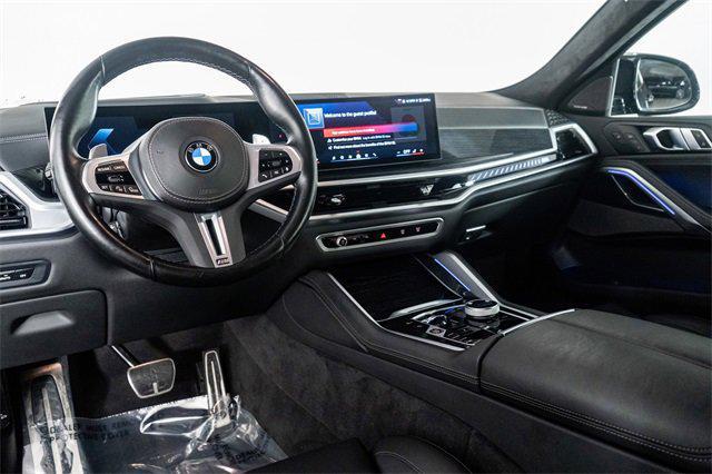 Photo of 2024 Black Sapphire Metallic BMW X6