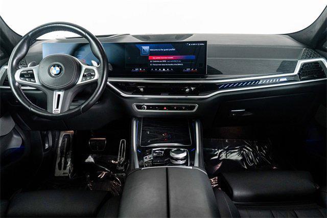 Photo of 2024 Black Sapphire Metallic BMW X6