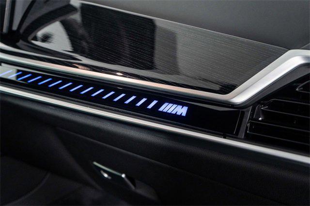 Photo of 2024 Black Sapphire Metallic BMW X6
