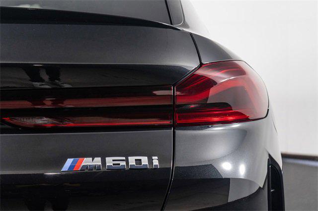 Photo of 2024 Black Sapphire Metallic BMW X6