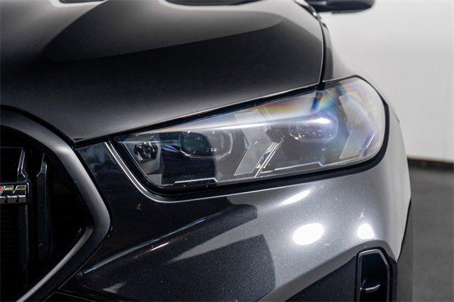 Photo of 2024 Black Sapphire Metallic BMW X6
