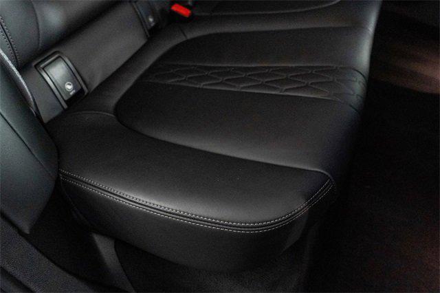 Photo of 2024 Black Sapphire Metallic BMW X6