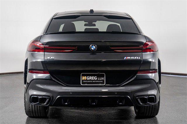 Photo of 2024 Black Sapphire Metallic BMW X6
