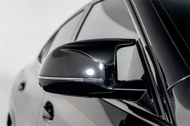 Photo of 2024 Black Sapphire Metallic BMW X6