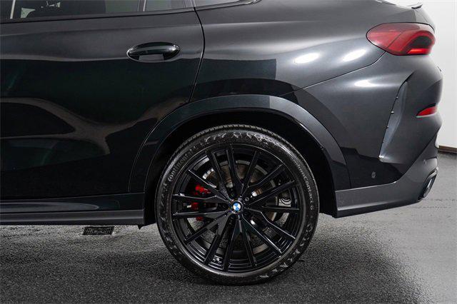 Photo of 2024 Black Sapphire Metallic BMW X6