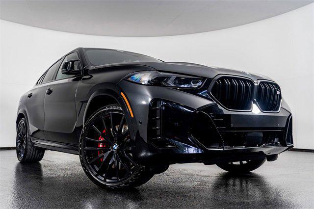 Photo of 2024 Black Sapphire Metallic BMW X6