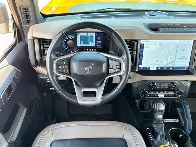 Photo of 2022 CYBER ORANGE MET TRI-COAT Ford Bronco
