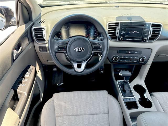 Photo of 2017 Black Cherry Kia Sportage
