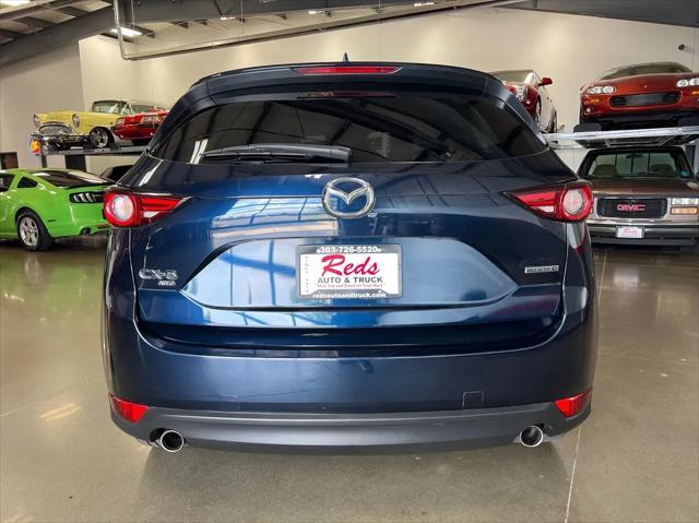 Photo of 2021 Deep Crystal Blue Mica Mazda CX-5