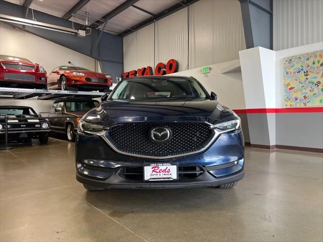 Photo of 2021 Deep Crystal Blue Mica Mazda CX-5