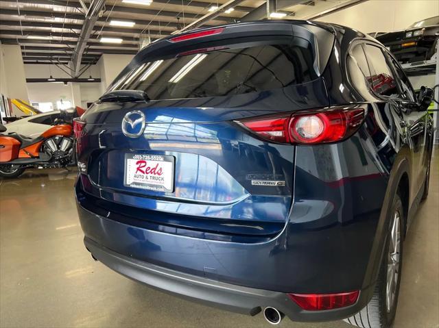Photo of 2021 Deep Crystal Blue Mica Mazda CX-5