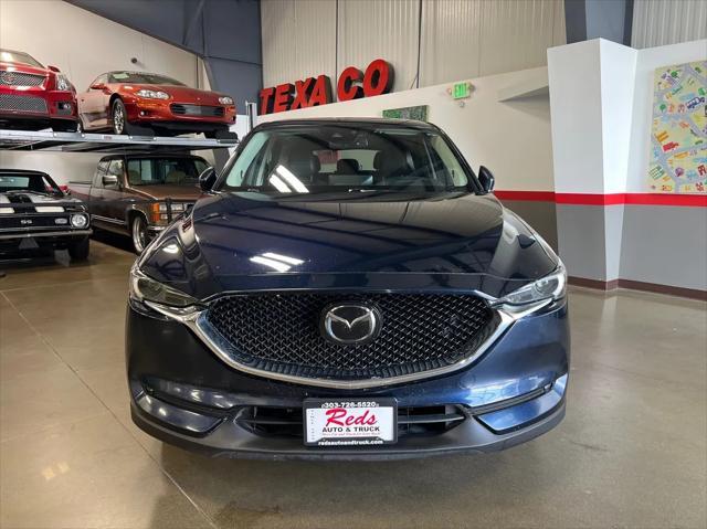 Photo of 2021 Deep Crystal Blue Mica Mazda CX-5