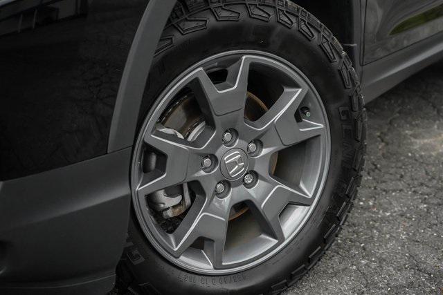 Photo of 2025 Crystal Black Pearl Honda Passport