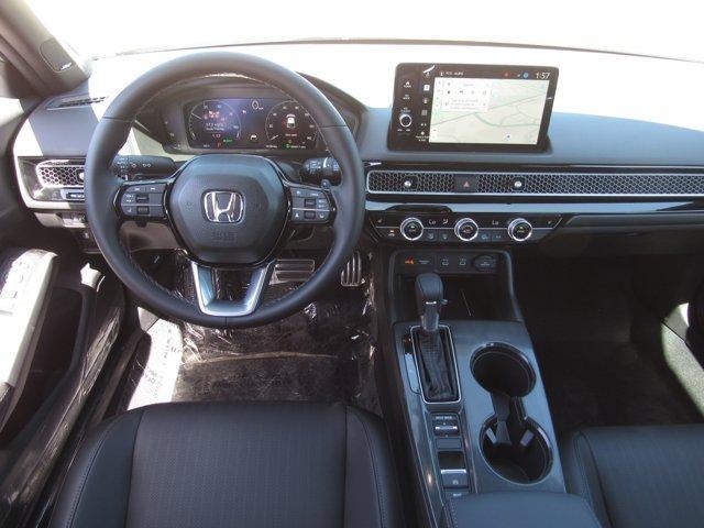 Photo of 2025 Sonic Gray Pearl Honda Civic Hybrid