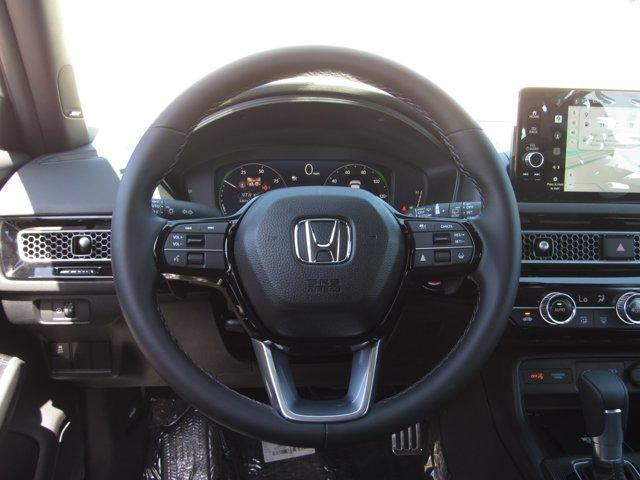 Photo of 2025 Sonic Gray Pearl Honda Civic Hybrid