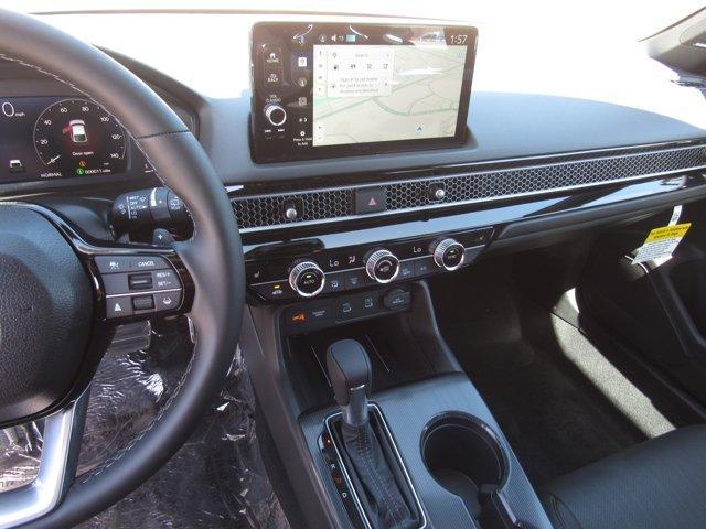 Photo of 2025 Sonic Gray Pearl Honda Civic Hybrid