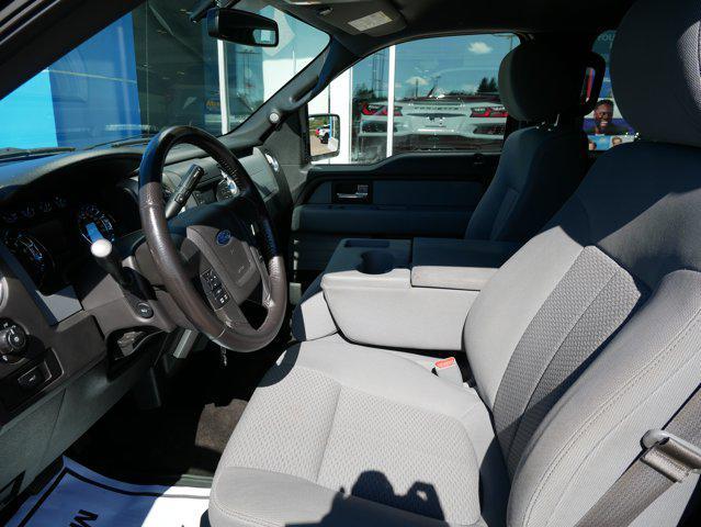 Photo of 2014 Ruby Red Metallic Tinted Clearcoat Ford F-150