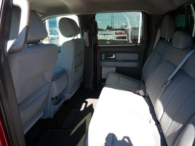 Photo of 2014 Ruby Red Metallic Tinted Clearcoat Ford F-150