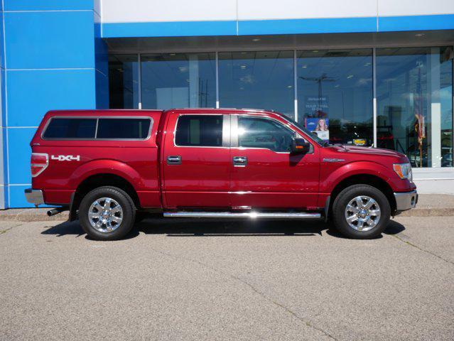 Photo of 2014 Ruby Red Metallic Tinted Clearcoat Ford F-150