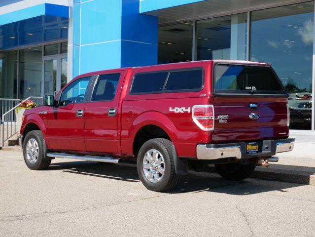 Photo of 2014 Ruby Red Metallic Tinted Clearcoat Ford F-150