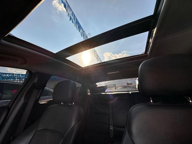 Photo of 2021 Black Cherry Metallic Chevrolet Malibu