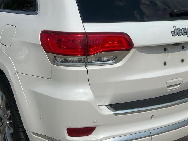 Photo of 2021 Ivory 3-Coat Jeep Grand Cherokee