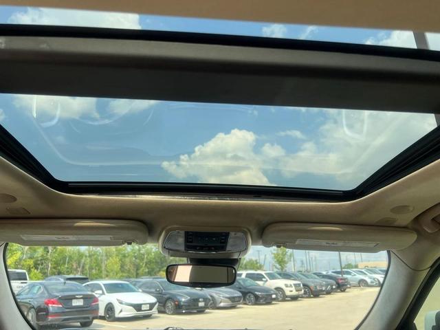 Photo of 2021 Ivory 3-Coat Jeep Grand Cherokee