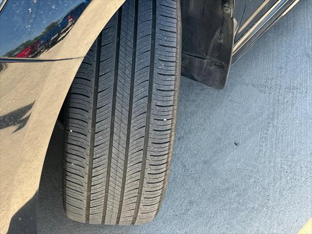 Photo of 2024 Midnight Black Toyota Camry