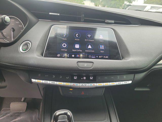 Photo of 2022 Crystal White Tricoat Cadillac XT4