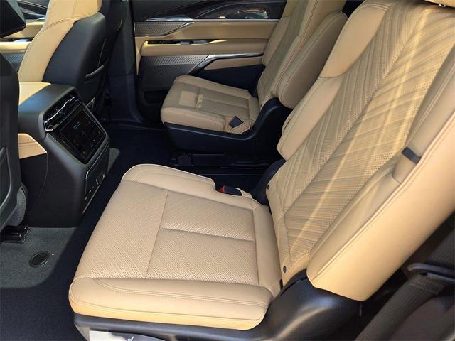 Photo of 2025 Black Raven Cadillac Escalade IQ