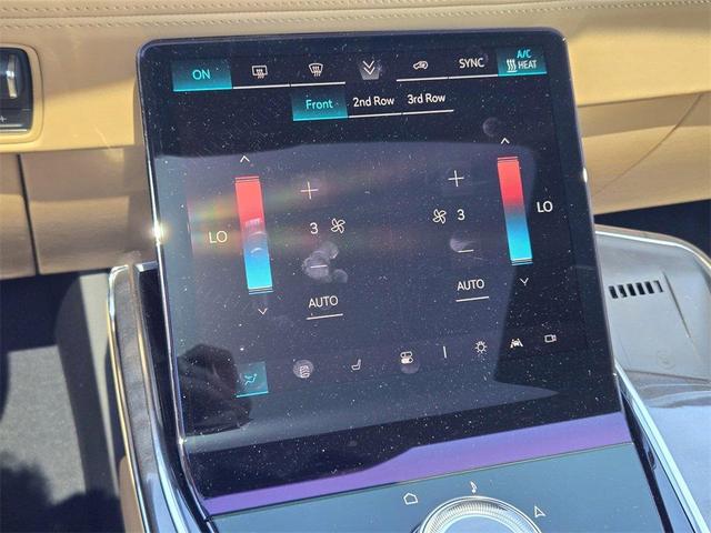 Photo of 2025 Black Raven Cadillac Escalade IQ