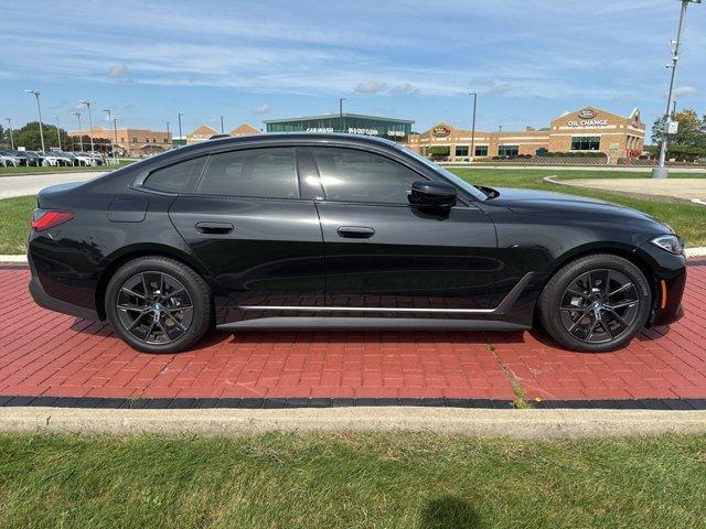 Photo of 2024 Black Sapphire Metallic BMW i4 Gran Coupe