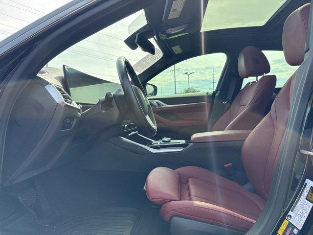 Photo of 2024 Black Sapphire Metallic BMW i4 Gran Coupe