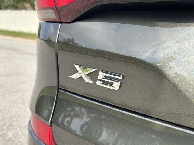 Photo of 2022 Manhattan Green Metallic BMW X5