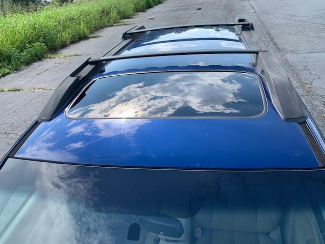 Photo of 2010 Blue Subaru Outback