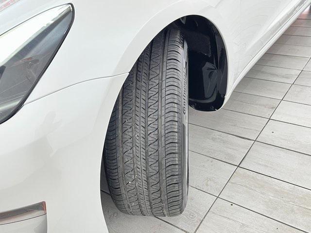 Photo of 2023 Pearl White Tesla Model 3