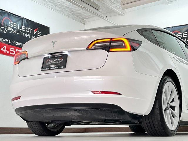 Photo of 2023 Pearl White Tesla Model 3