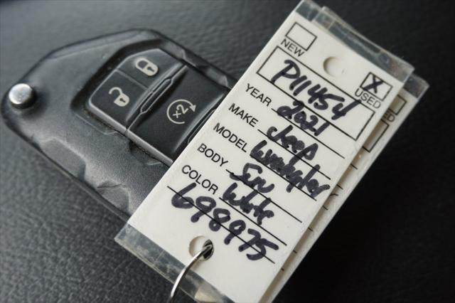 Photo of 2021 Bright White Clearcoat Jeep Wrangler Unlimited 4xe