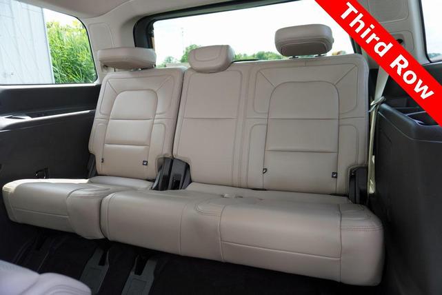 Photo of 2023 Pristine White Metallic Tri-Coat Lincoln Navigator