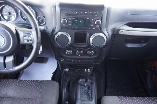 Photo of 2011 Mango Tango Pearlcoat Jeep Wrangler Unlimited