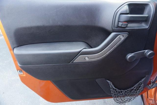 Photo of 2011 Mango Tango Pearlcoat Jeep Wrangler Unlimited