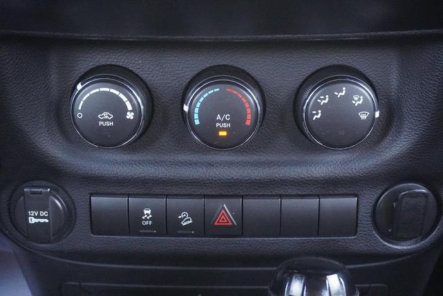 Photo of 2011 Mango Tango Pearlcoat Jeep Wrangler Unlimited