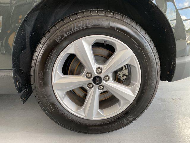 Photo of 2024 Forged Green Metallic Ford Edge