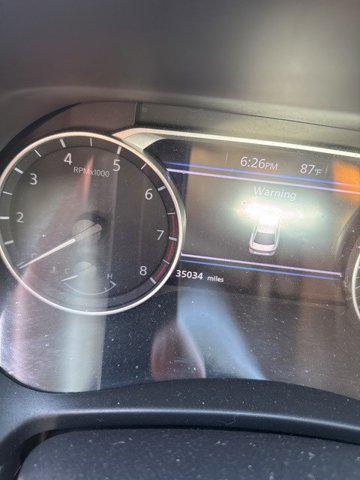 Photo of 2024 Electric Blue Metallic/Super Black Nissan Sentra
